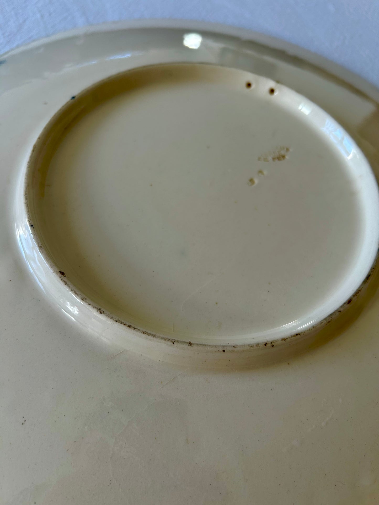 Plat rond - Terre de fer - Longchamp